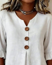Blusa Sofía de algodón-lino lisa con botones de madera y volantes, blusa elegante, estilo puesto | Moda Acosta