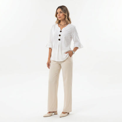 Blusa Sofía de algodón-lino lisa con botones de madera y volantes