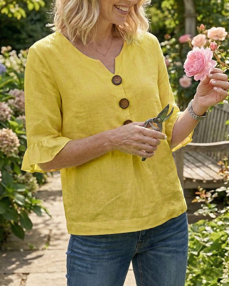 Blusa Sofía de algodón-lino lisa con botones de madera y volantes, blusa elegante, vista frontal | Moda Acosta