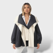 Trench elegante de algodón encerado resistente al agua, abrigo de invierno, vista lateral | Moda Acosta